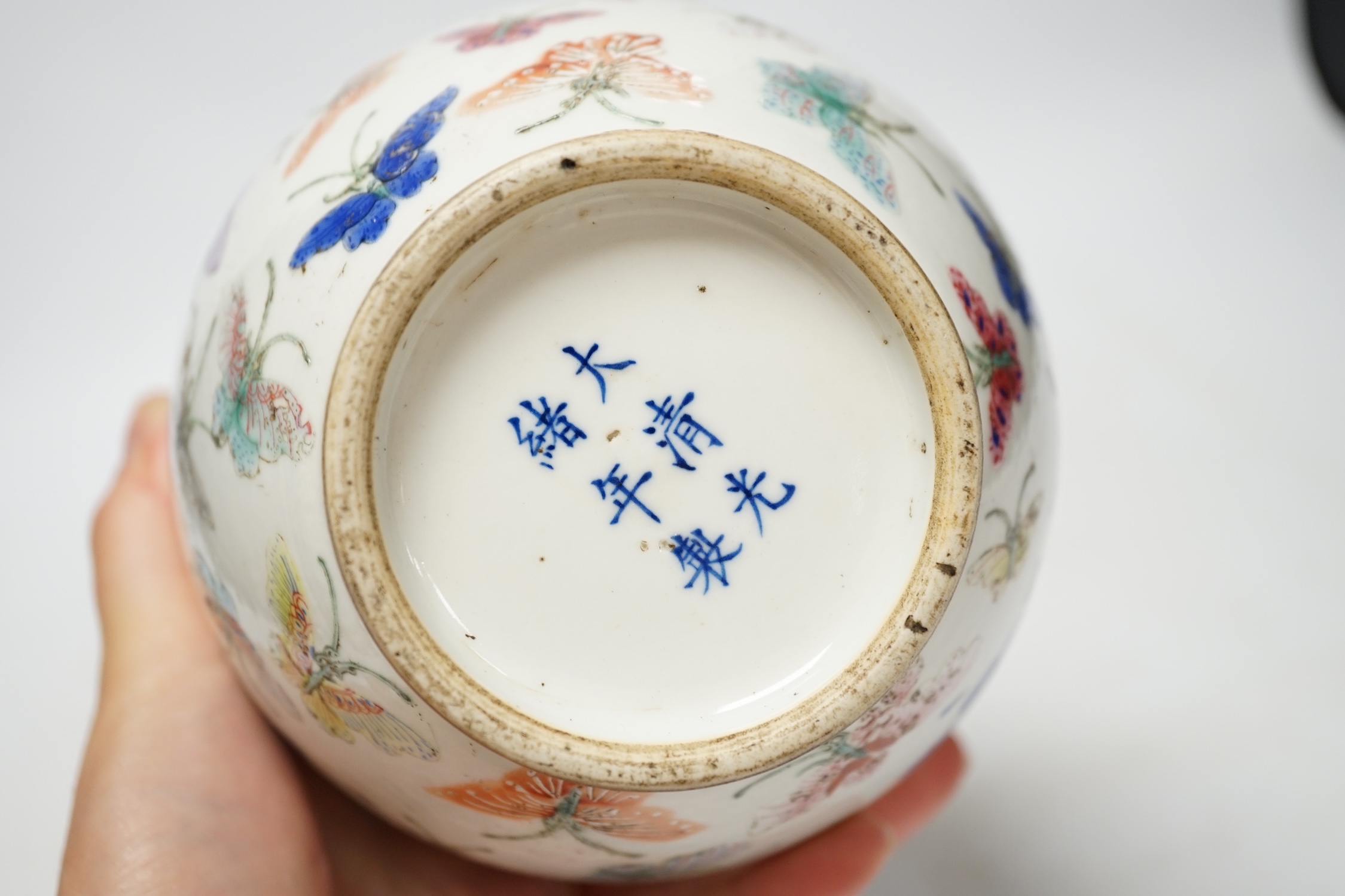 A Chinese famille rose ‘butterflies’ vase, 29cm high. Condition - good, light scratches to footrim, otherwise good. Guangxu marks